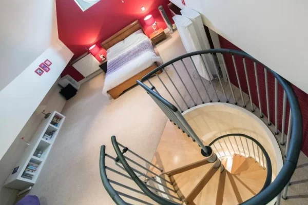 Spiral staircase to bedroom 2